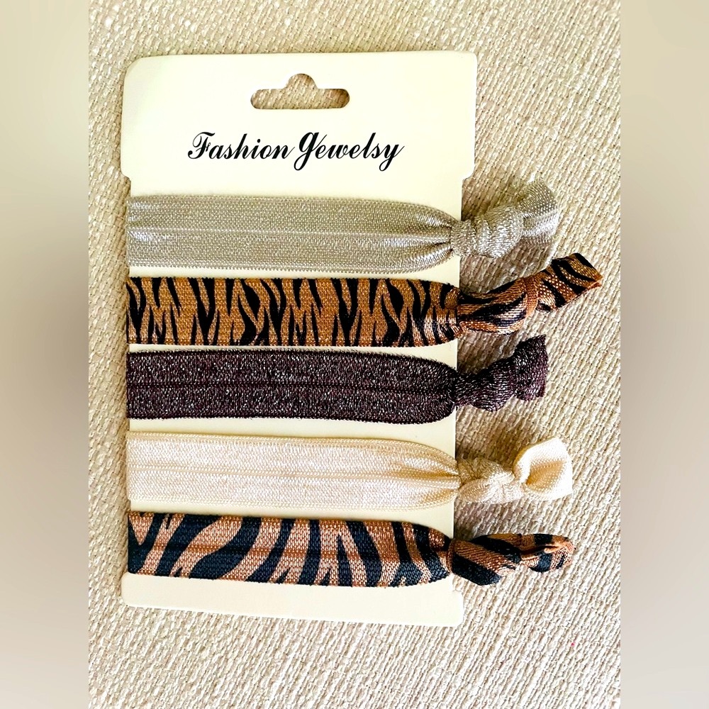 New Hair Ties or Bracelets. Multiple colors. 5 total pieces.